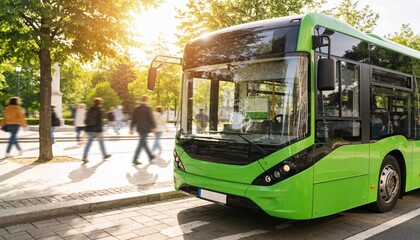 Green electric city bus on urban street promoting eco public transport and sustainable mobility.