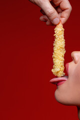 Man puts shrimp tempura in sexy girl's mouth. Sexy food