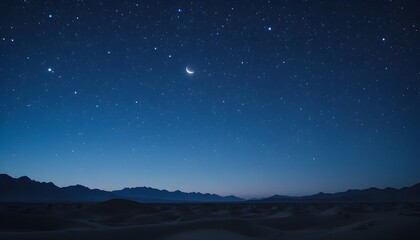 Stunning starry night sky over desert landscape with crescent moon