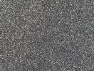 Macro shot of medium grey metallic car paint texture