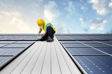 Technician installing solar panels on rooftop for clean energy transition
