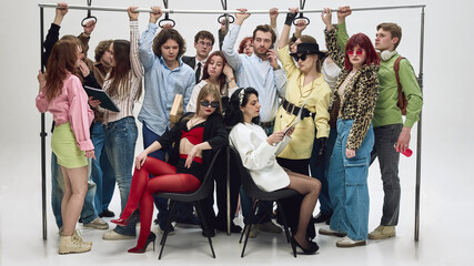 Crowded group of people holding handrails standing tightly in subway carriage. Concept of rush hour commute, urban transport pressure, overcrowding problem, and daily city life.