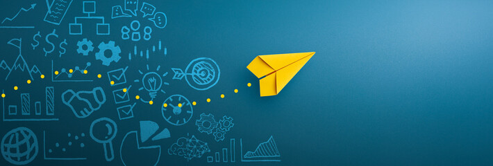 Yellow paper plane and business strategy on blue background, Business success, innovation and solution concept, copy space