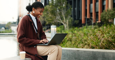 Businesswoman, smile and remote work in city with laptop, typing and copywriting for email marketing. Happy, black person or freelancer in urban town with computer, draft newsletter and SEO campaign.