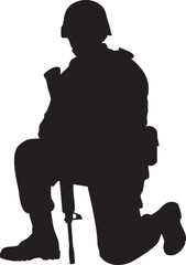 Silhouette of a soldier kneeling with a rifle
