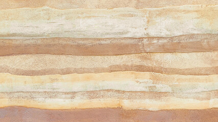 Horizontal layered rammed earth wall texture background. Abstract natural clay, sand, and soil pattern with beige, orange, and brown stripes for organic interior design and architecture mockup.