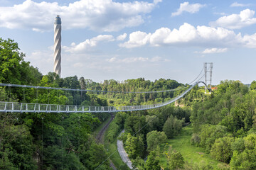 Suspension bridge Neckarline over Neckar river and TK Elevator Test Tower in Rottweil, Germany