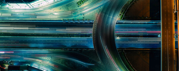 Abstract urban mobility background showing fast moving traffic and modern city roads designed for technology marketing, future transportation, sustainable infrastructure, and finance concepts.