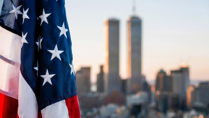 American flag with blurred World Trade Center Twin Towers background for Patriot Day remembrance
