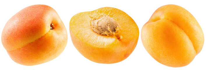 Three fresh apricots including a sliced one isolated on a white background