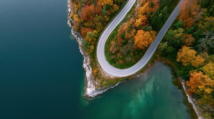 The Winding Road Through Autumn Forest Over Turquoise Lake Panorama