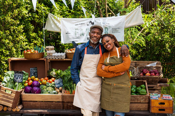 Smiling vendors at outdoor market